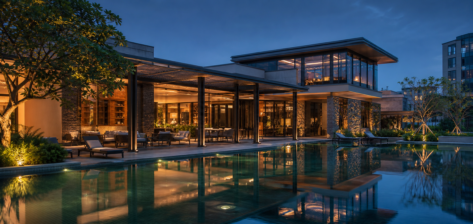 Residents clubhouse and pool terrace at blue hour